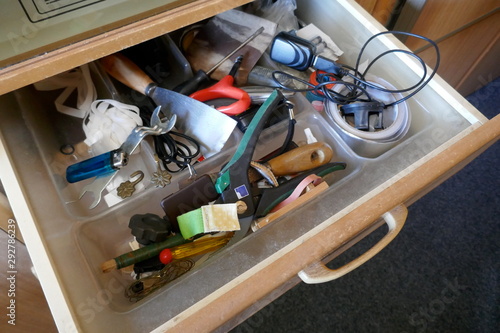 Photo Looking into a untidy drawer