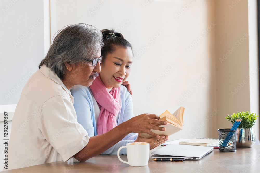 Senior couple are working at home using computers and laptops, with the internet communicating online with other people. Senior couple are working at home using computers and laptops, with the internet communicating online with other people.