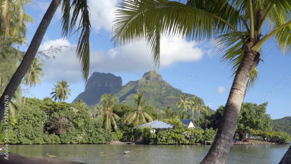 Bora Bora and Mount Otemanu in Tahiti, French Polynesia, palm trees coral lagoon sea and Mt Pahia, Mt Otemanu, Tahiti, south Pacific Ocean. Bora Bora and Mount Otemanu in Tahiti, French Polynesia, palm trees coral lagoon sea and Mt Pahia, Mt Otemanu, Tahiti, south Pacific Ocean.