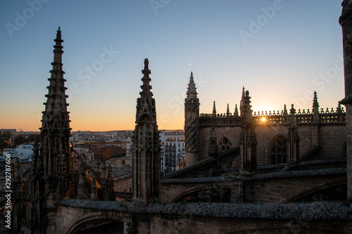 The flying buttress from the roof of the cathedral of Sevilla, Spain during sunset © Joseph Creamer
