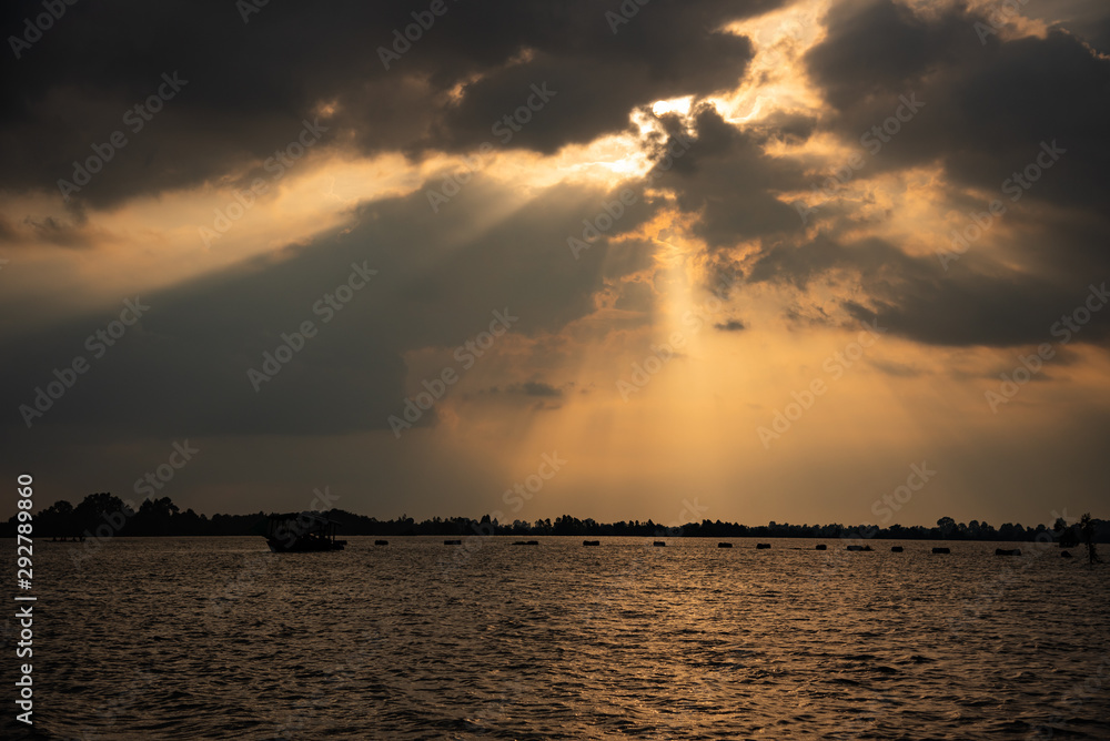 Beautiful Silhouette Landscape Sunset Time In Flood Area. Beautiful Silhouette Landscape Sunset Time In Flood Area.