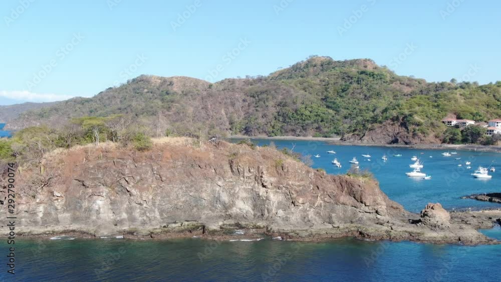 Boats at the beach in the tropical ocean off Guanacaste, Costa Rica Boats at the beach in the tropical ocean off Guanacaste, Costa Rica