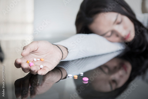 Teenage girl overdose of drugs at home photo