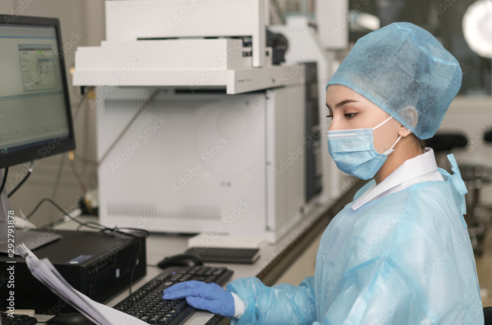 Young female scientist working in the laboratory. Young female scientist working in the laboratory.