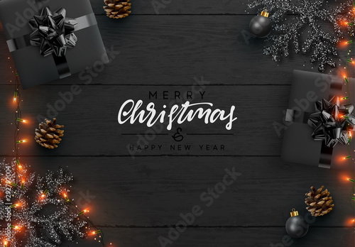 Christmas background. Wood plank texture, black snowflakes are strewn with sparkles, realistic pine cones, decorative bauble, gift boxes, xmas bright light gold garland. Merry Christmas Happy New Year