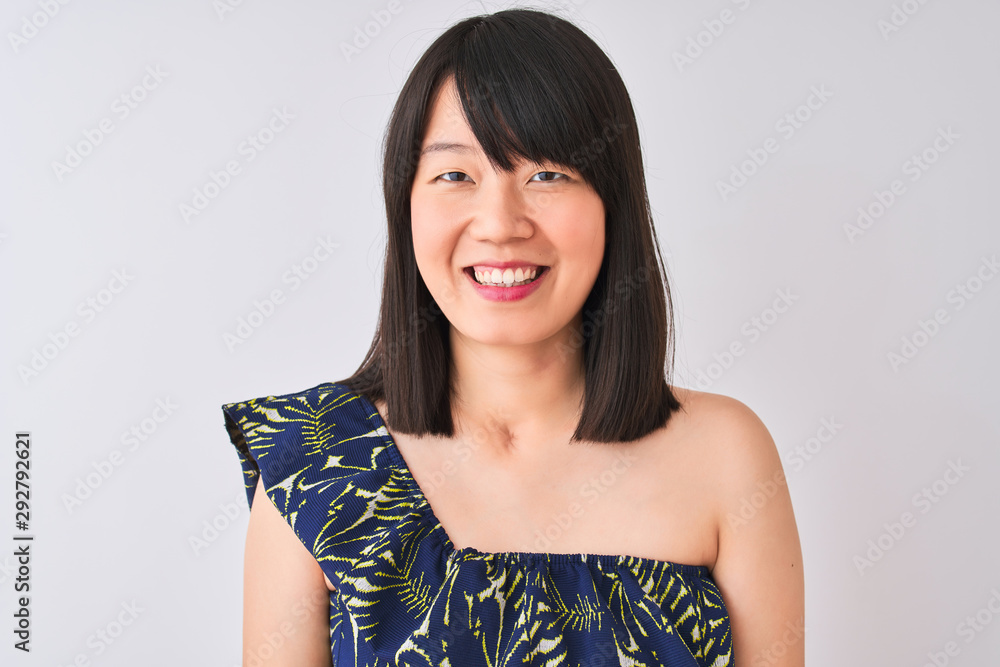 Young beautiful chinese woman wearing summer floral t-shirt over isolated white background with a happy face standing and smiling with a confident smile showing teeth Young beautiful chinese woman wearing summer floral t-shirt over isolated white background with a happy face standing and smiling with a confident smile showing teeth