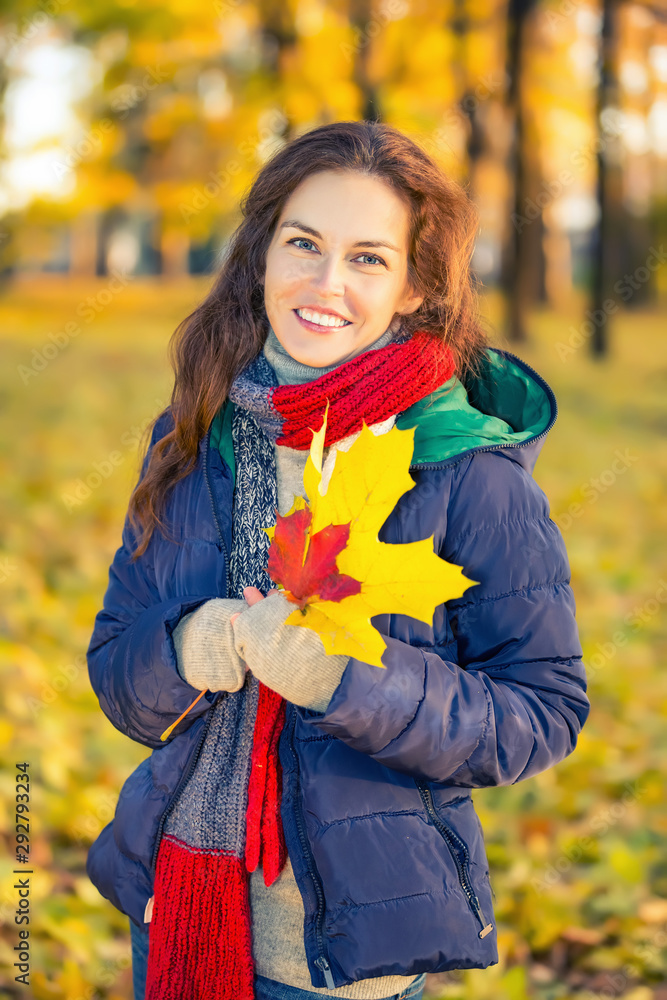 Young beautiful woman in autumn park Young beautiful woman in autumn park