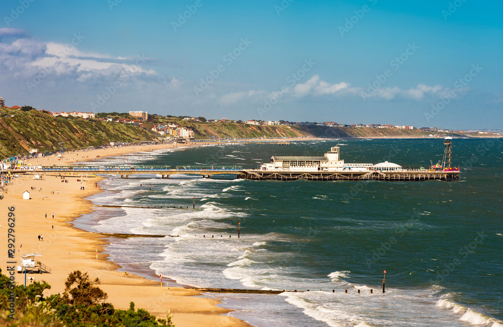 Rolling waves crash onto the beach at Bournemouth Pier Rolling waves crash onto the beach at Bournemouth Pier