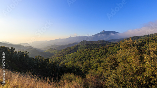 Fototapeta Naklejka Na Ścianę i Meble -  Foggy Mountain landscape on a blue sunny sky morning in Catalonia Pyrenees