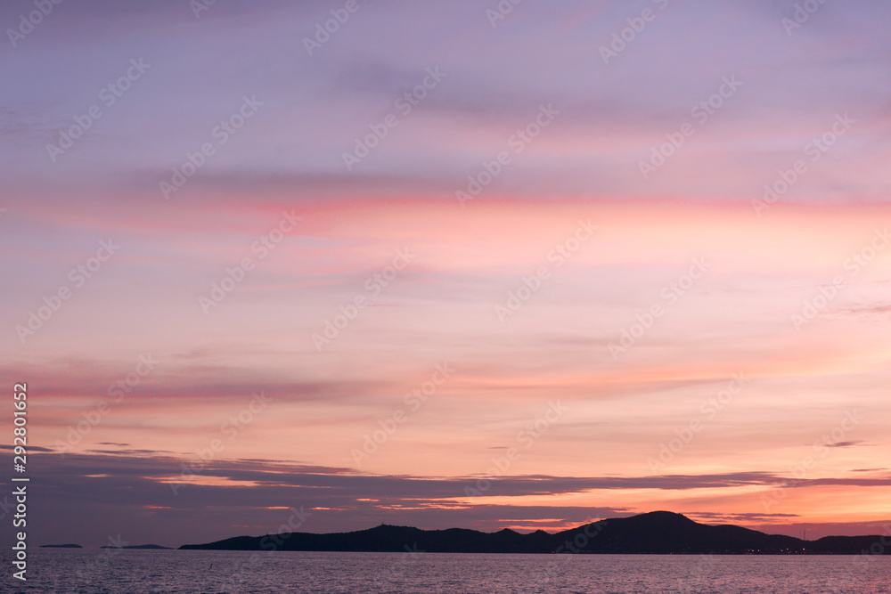 Sea sunset landscape. Pink clouds.