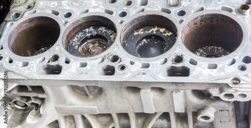 Engine block and piston with rust , Automotive engine damage occurs when water enters the engine and is compressed.