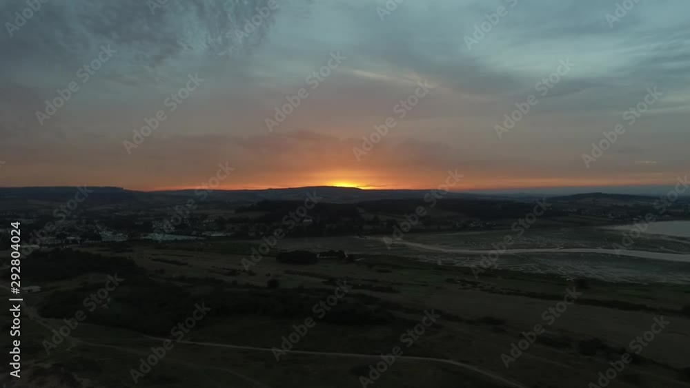 Dawlish Warren red sky sunset late Devon UK. Aerial view using a drone. Dawlish Warren red sky sunset late Devon UK. Aerial view using a drone.