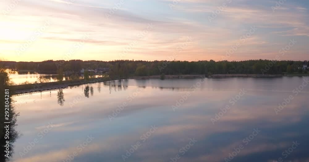 Sunset Over Lake and Scandinavian Forest in Sweden Aerial Drone Backward Shot Sunset Over Lake and Scandinavian Forest in Sweden Aerial Drone Backward Shot
