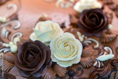 Chocolate cake. Cream flowers. Birthday Treats.