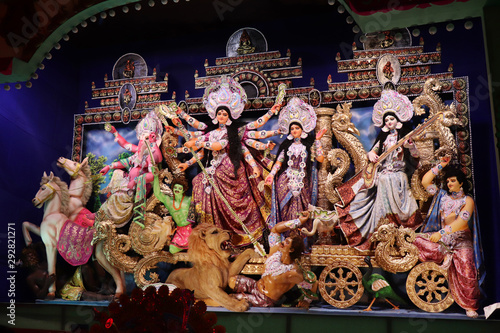 Valokuva Goddess Durga idol at decorated Durga Puja pandal, shot at colored light, at Kolkata, West Bengal, India