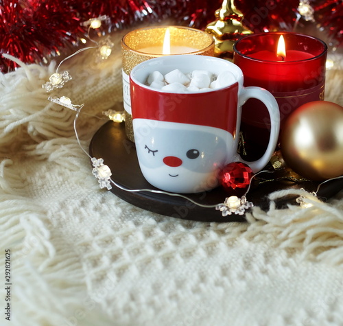 christmas background in gold and red colors decorations and cup of coffee wit...