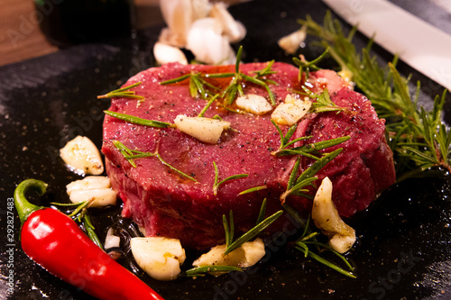 Beef Steak with rosemarin and chili and garlic photo