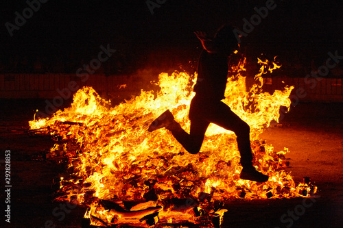 Konstfotografi Summer solstice celebration in Spain. Jumping into the fire.