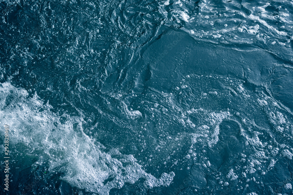 Blue and turquoise water with irregular wave structure Blue and turquoise water with irregular wave structure