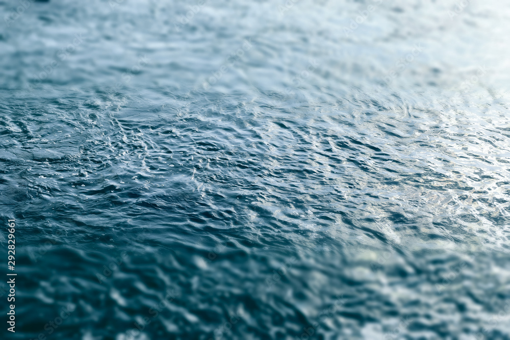 Blue and turquoise water with irregular wave structure Blue and turquoise water with irregular wave structure