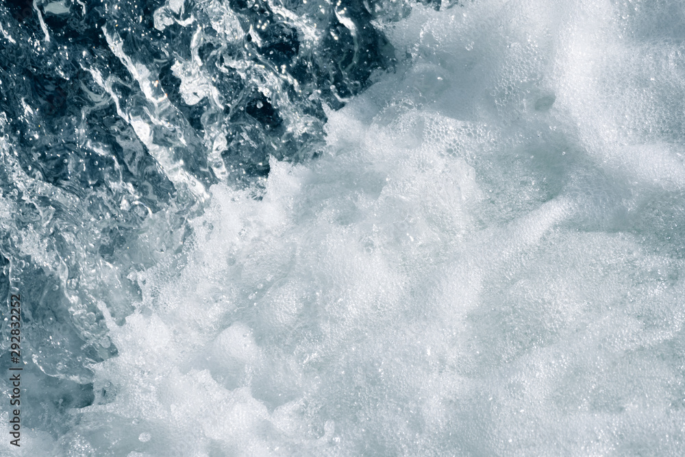 Blue and turquoise water with irregular wave structure Blue and turquoise water with irregular wave structure