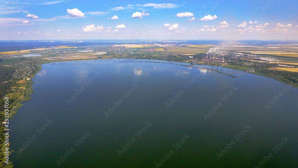 DCIM\100MEDIA\DJI_aerial photo of the big lake in the forest with cumulus clouds0028.JPG