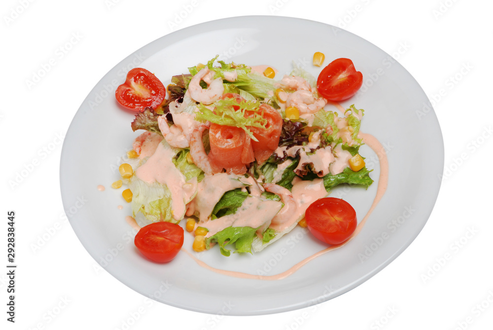 Vegetable seafood salad in plate on a white isolated background