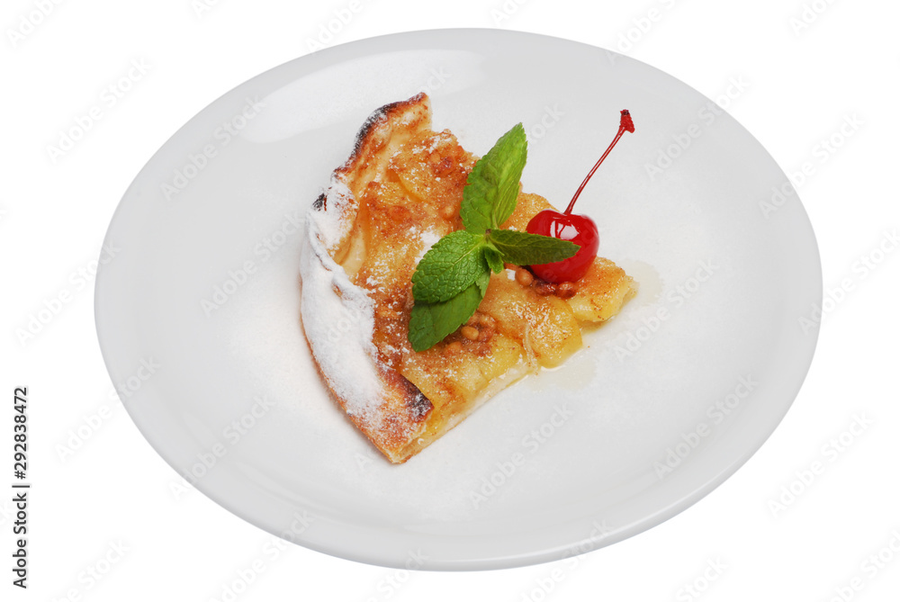 A slice of pie on a plate on a white isolated background
