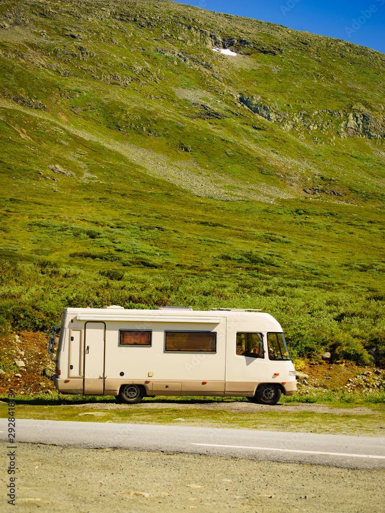 Camper car in norwegian mountains