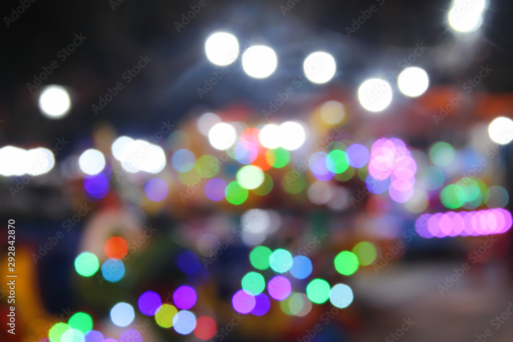 Colorful sparkle glitter bokeh night traffic from light bulb ,motorcycle and car background Colorful sparkle glitter bokeh night traffic from light bulb ,motorcycle and car background