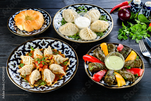 Set of dishes of Uzbek cuisine , Manty, plov, dolma and lagman