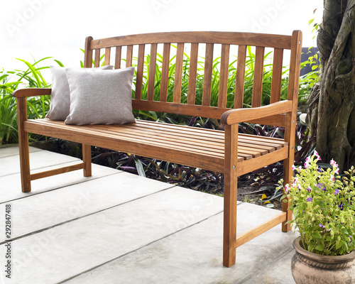 The wood bench in the backyard.