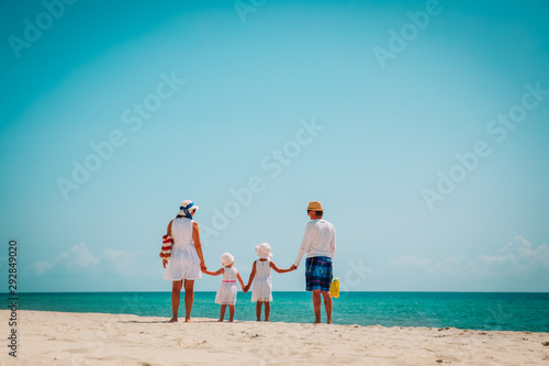 happy family with two kids walk on beach © nadezhda1906