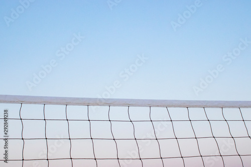 Beach volleyball net, summer vacation, sport concept. isolated sky background. © mertkantekin