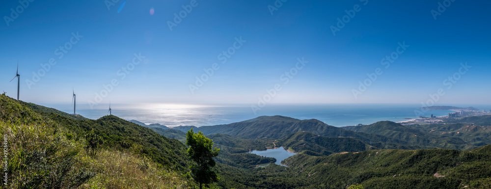 Looking at the scenery of the sea on the mountain