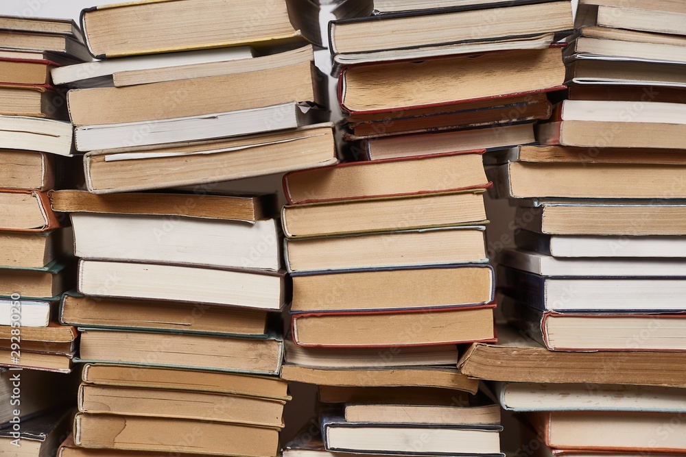 Obraz premium Pile of books close up background