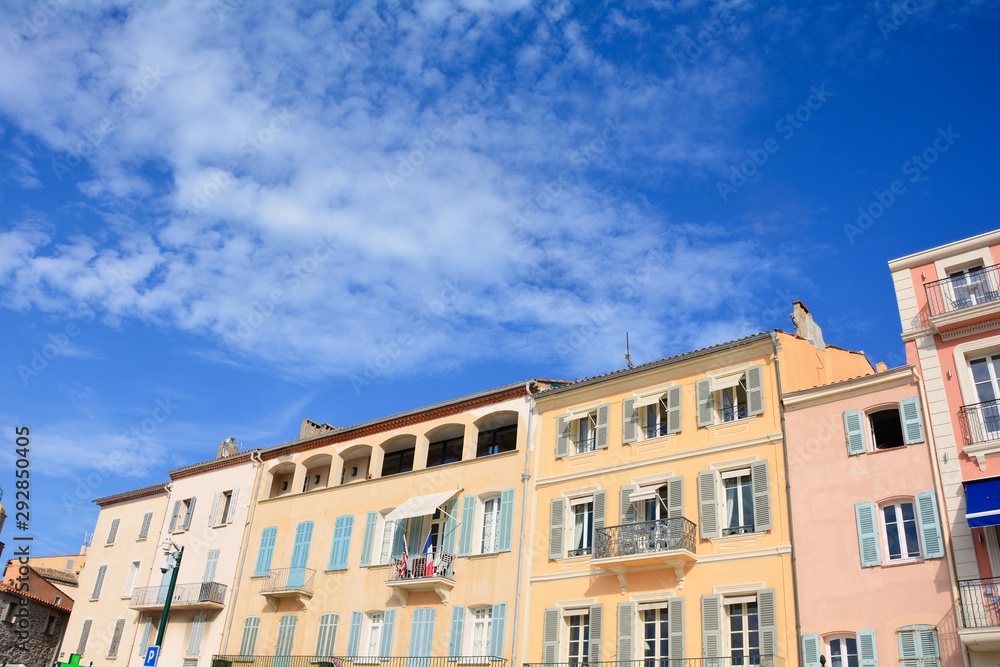 House facade in the historic center of Saint Tropez, France, withmany  blue sky
