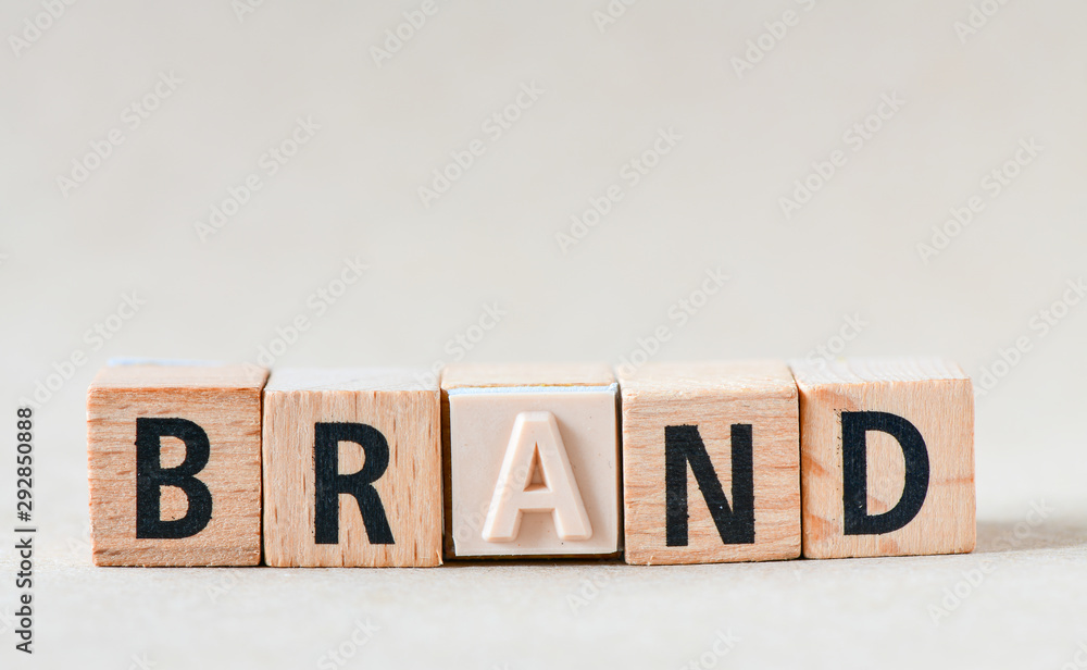 Fototapeta premium word BRAND on wooden cube block