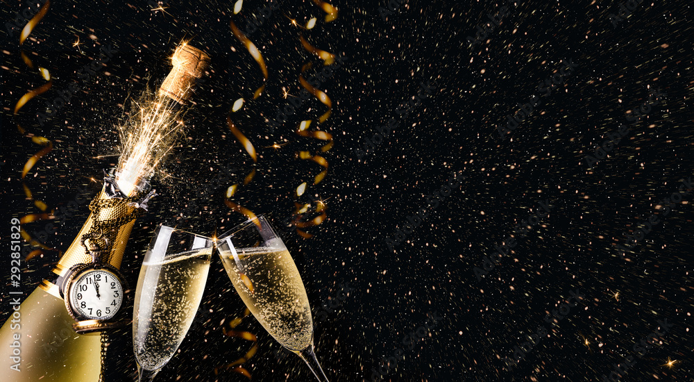 New year party concept with a exploding champagne bottle - obrazy, fototapety, plakaty 
