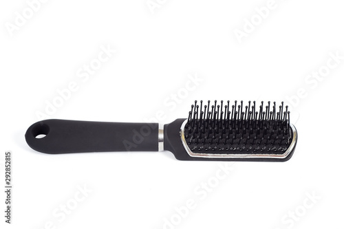 Comb with hair loss on white background ,health beauty concept.