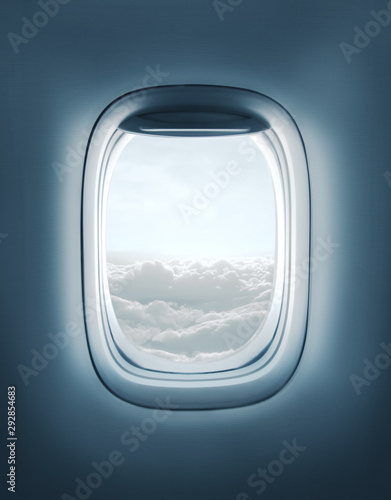 Fototapeta okno samolotu z widokiem chmur