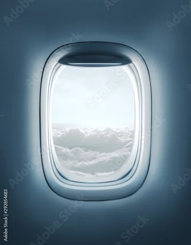 Fototapeta okno samolotu z widokiem chmur