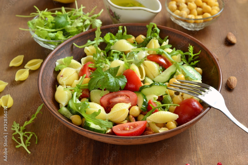 Mediterranean pasta salad with vegetables and chickpeas