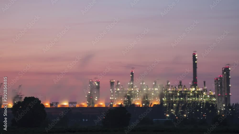Timelapse night light oil refinery terminal is industrial facility for storage of oil and petrochemical. oil manufacturing products. power electric plant. footage video 4k. Timelapse night light oil refinery terminal is industrial facility for storage of oil and petrochemical. oil manufacturing products. power electric plant. footage video 4k.