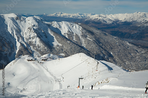 Ski slope snowy alpine high mountain landscape photo