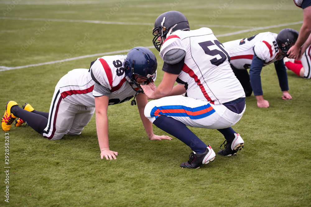 Fototapeta premium professional american football players training