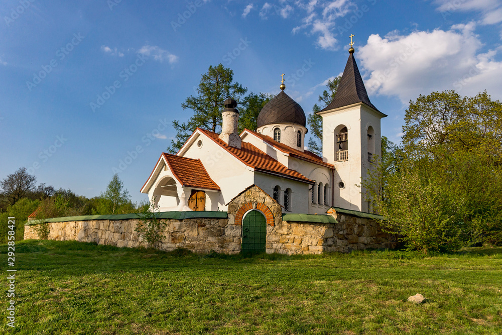 Fototapeta premium Beautiful church on the lawn