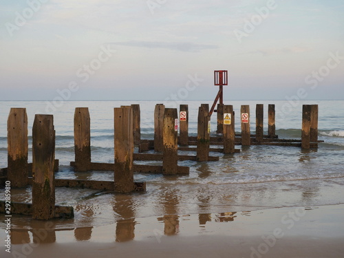 sunset at Claremont pier and ruined jetty Lowestoft photo