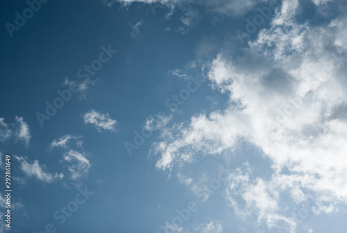 Blue sky with beautiful white clouds © oleg