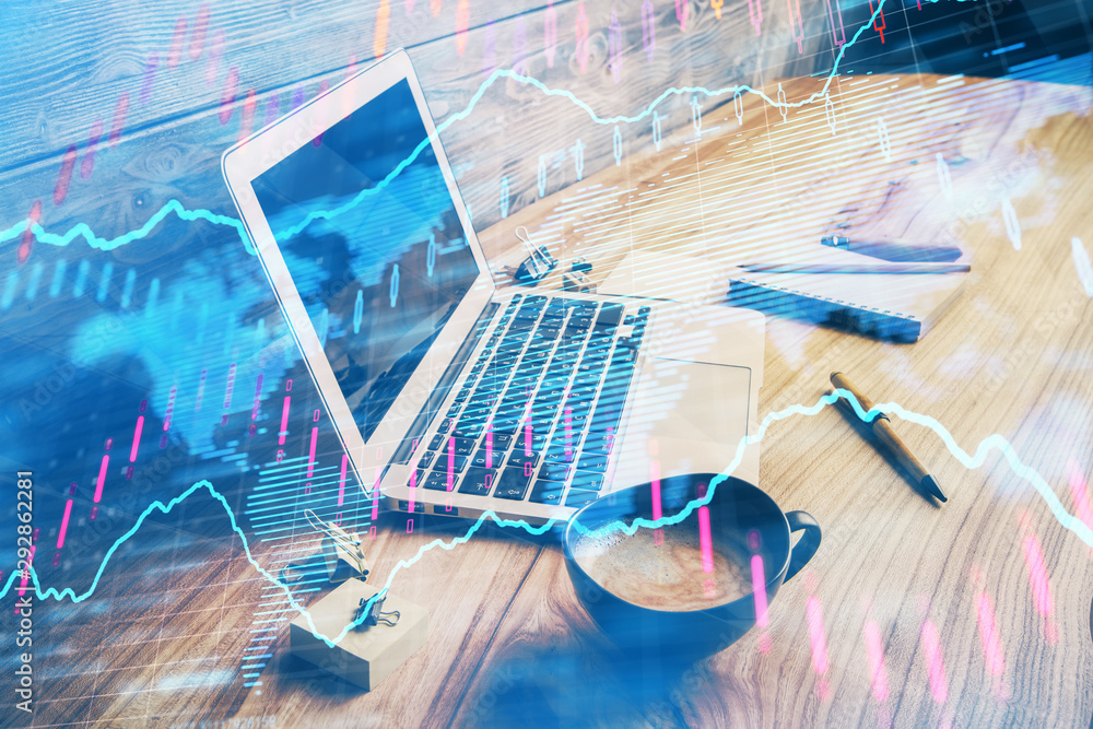 Double exposure of graph and financial info and work space with computer background. Concept of international online trading. Double exposure of graph and financial info and work space with computer background. Concept of international online trading.